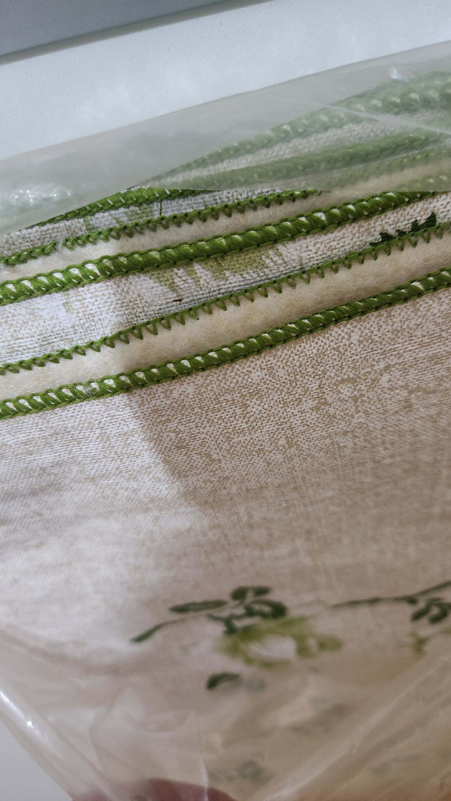 'Classic Collection' flannel-back tablecloth with green floral and vine pattern