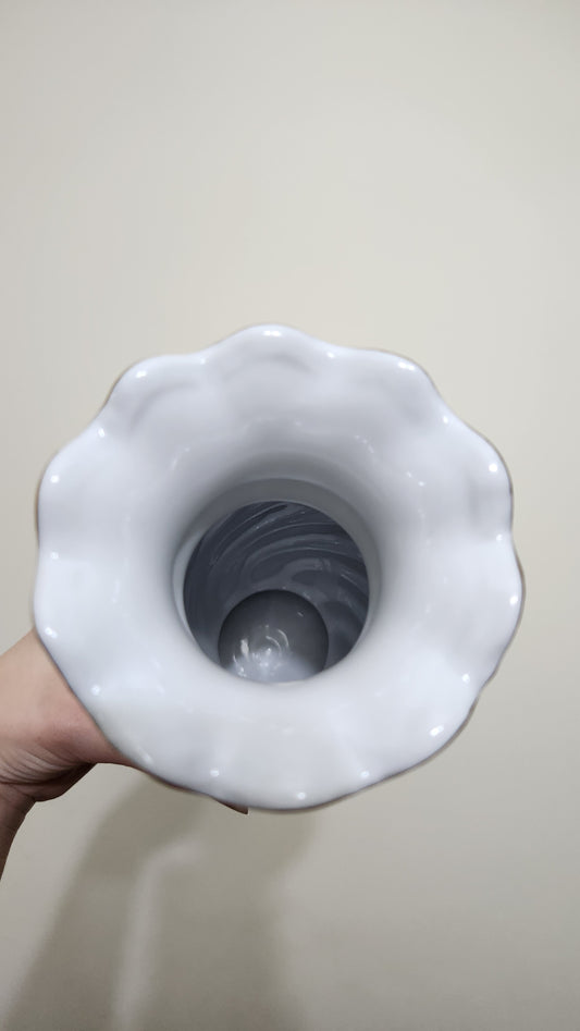 white porcelain vase with a floral and butterfly design