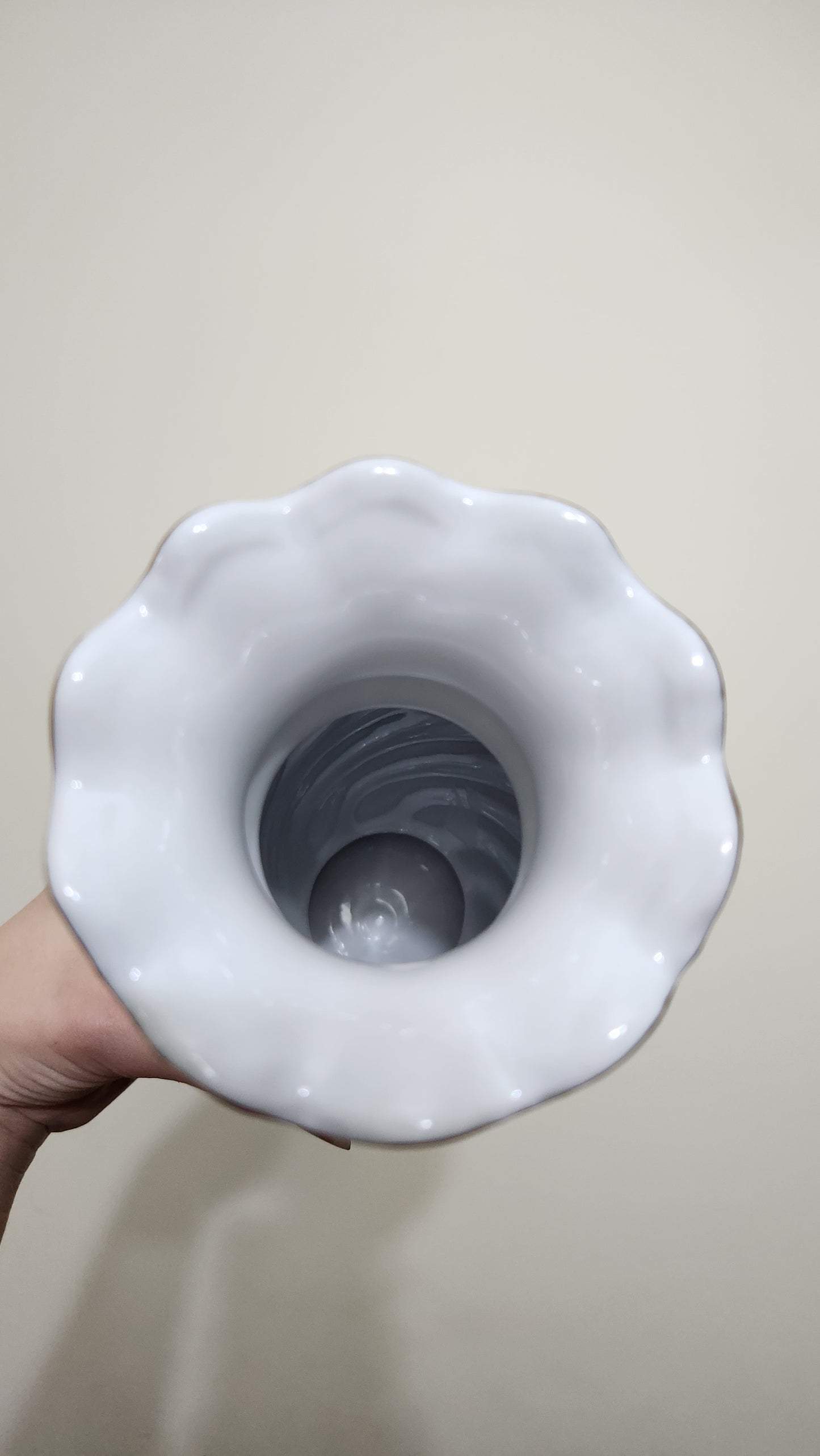 white porcelain vase with a floral and butterfly design