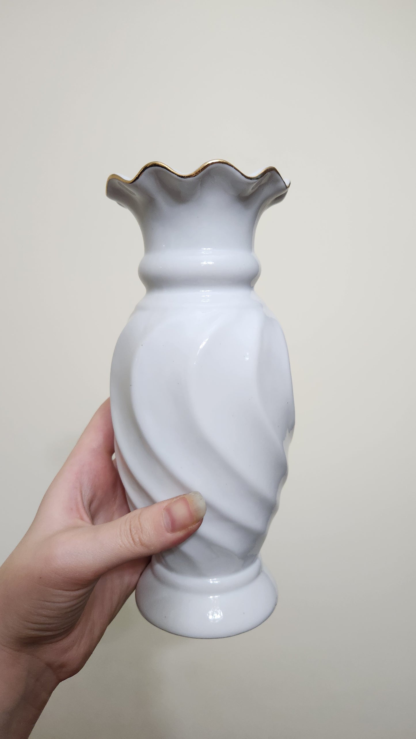 white porcelain vase with a floral and butterfly design