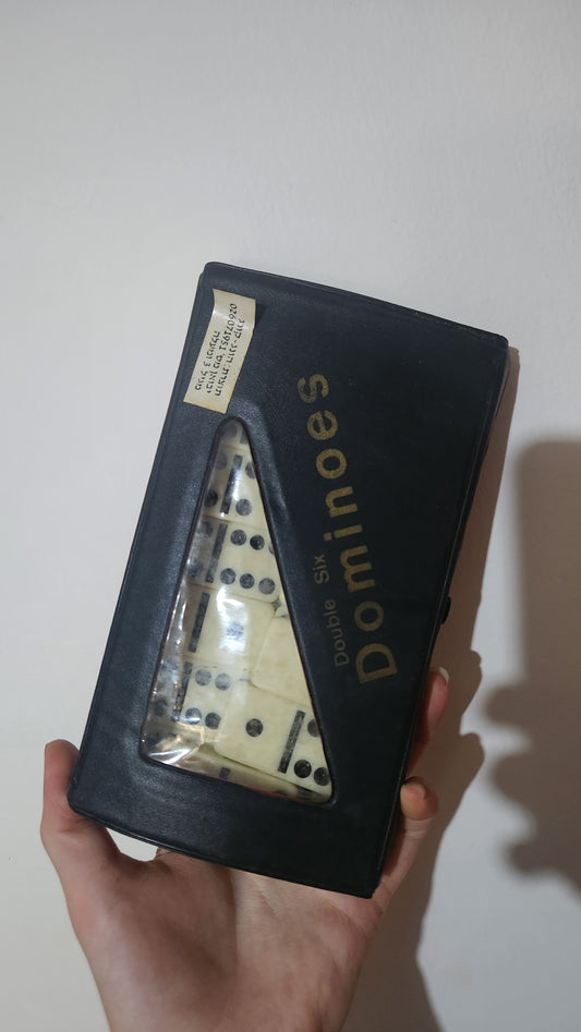 Double Six dominoes set in a black carry case